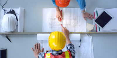 top-view-group-engineering-team-is-meeting-planning-construction-work